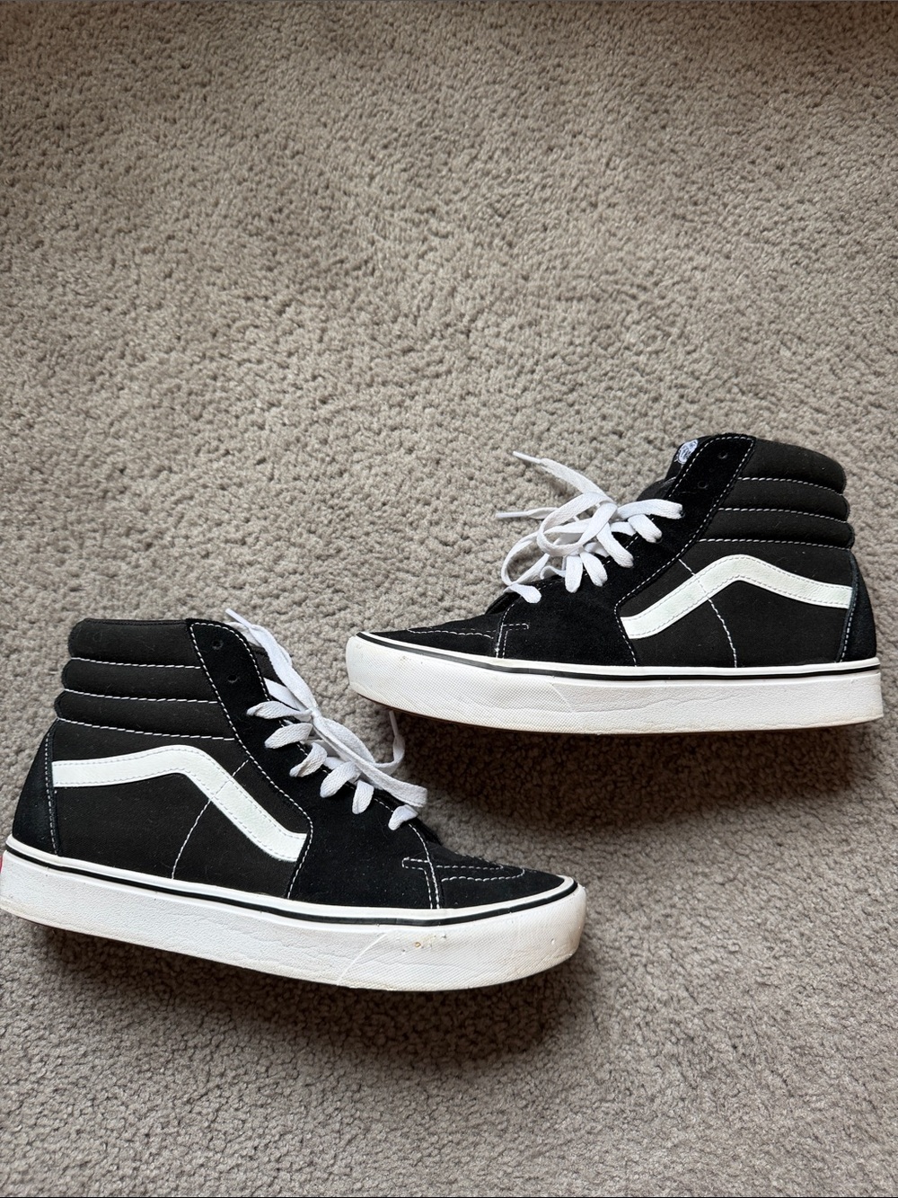 Vans Black and White High-Top Skate Sneakers